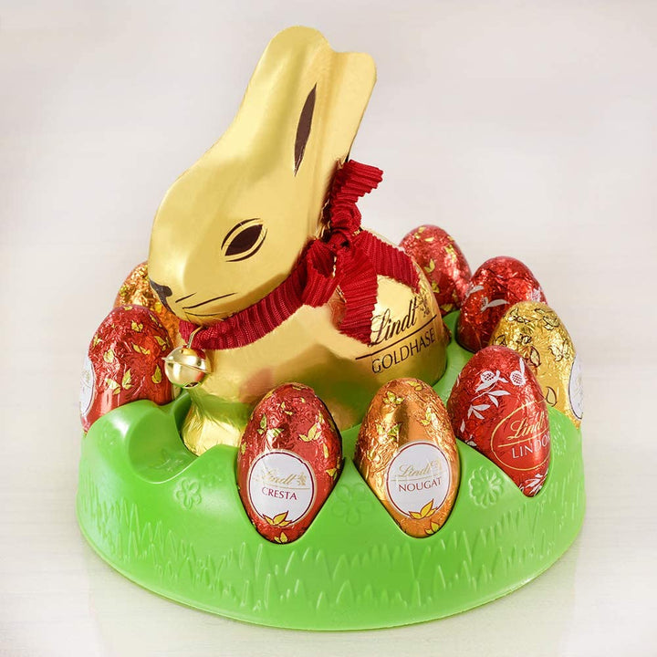 Lindt Schokolade Hasen-Nest | 194 G | Geschenk Mit Vollmilch GOLDHASE Und 8 Eiern in Den Sorten LINDOR Milch, Vanille Trüffel, Cresta, Nougat | Oster Schokolade | Schokoladengeschenk