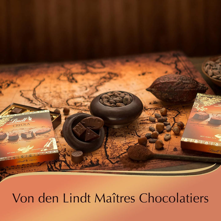 Lindt Schokolade - Creola Pralinés | 165 G | Pralinen Schachtel Mit 15 Pralinen in 4 Köstlichen Sorten Ohne Alkohol Mit Kakao Nibs Aus 100 % Edelkakao | Pralinengeschenk | Schokoladengeschenk