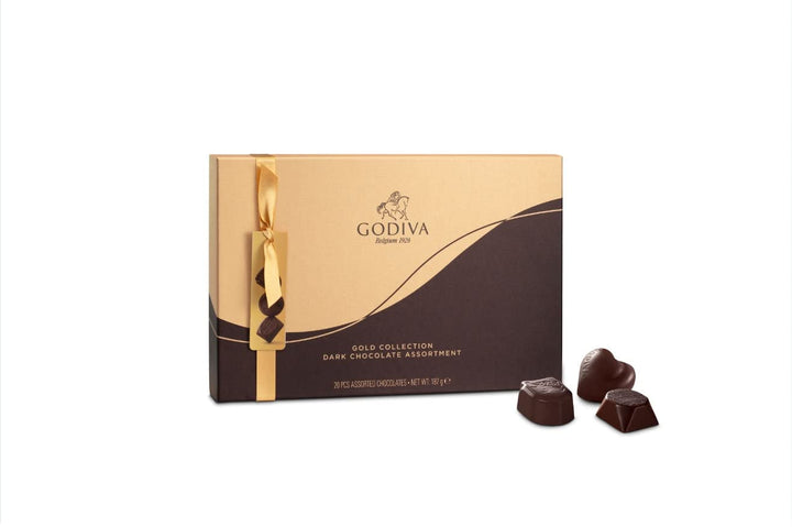 Ciocolată Godiva Connoisseur combinată cu fructul pasiunii, mousse de vanilie, caramel și alte umpluturi delicioase 