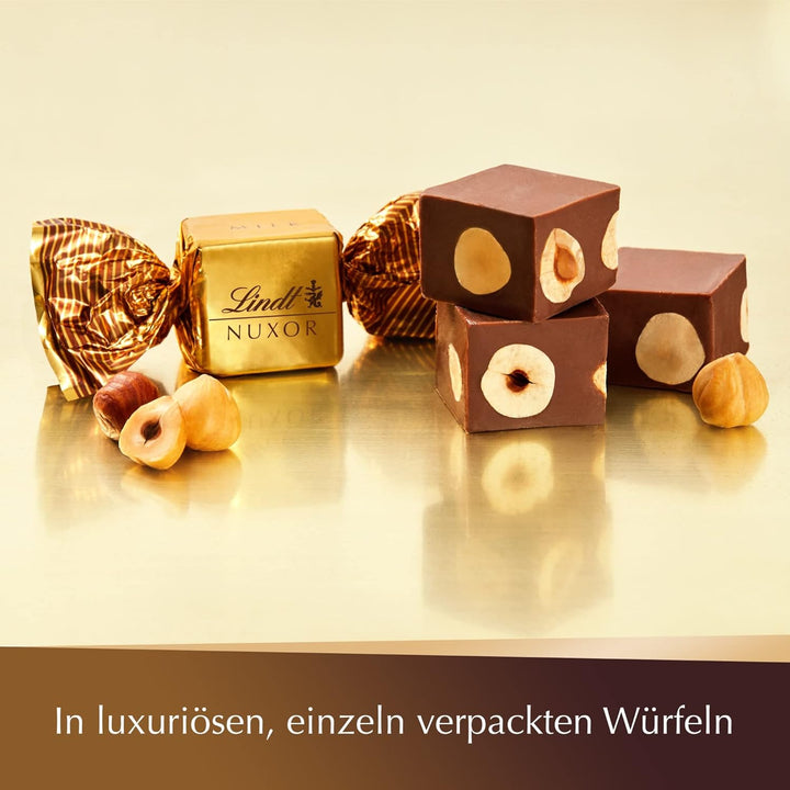 Lindt Schokolade NUXOR Milch | 103 G Beutel | Cremige Gianduja Milch-Schokolade Mit Ganzen, Gerösteten Haselnüssen | Pralinen-Geschenk | Schokoladengeschenk